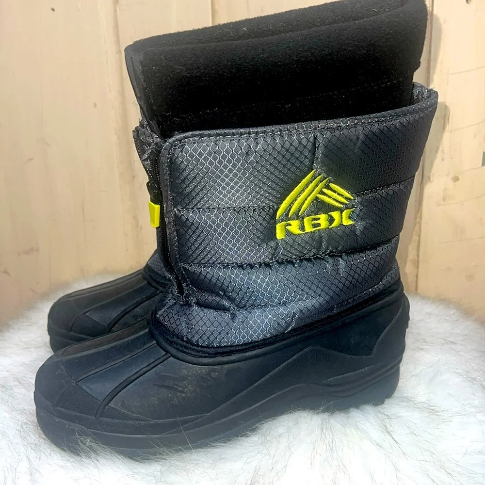 Size 6 RBX Zip up snow boots Cushion lining to keep warm. Like new. Gray & black